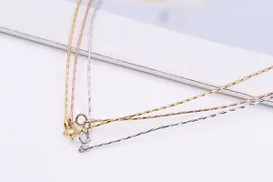 Detailed macro view of S925 sterling silver box chains in gold, rose gold and silver finish