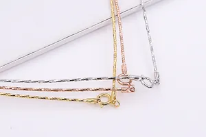 Macro shot of S925 sterling silver box chain necklaces showing 925 hallmarks