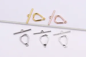 Macro detail of S925 sterling silver geometric OT toggle clasps for DIY jewelry making