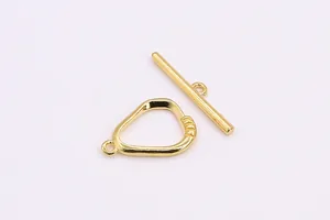Macro detail of golden geometric S925 silver OT toggle clasp for jewelry necklaces