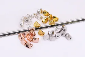 Close-up of S925 sterling silver square spacer beads in four colors for DIY jewelry