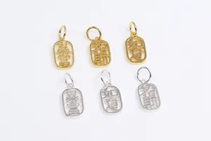 Detailed view of six hollow S925 sterling silver square lucky pendants in gold and silver