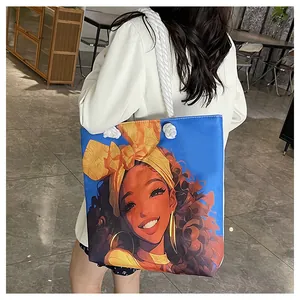 Detail of artistic cartoon print and rope handles on a stylish canvas tote bag