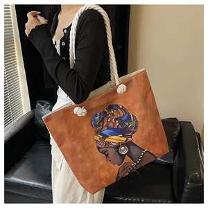 Artistic African woman print canvas tote bag with thick rope shoulder strap detail