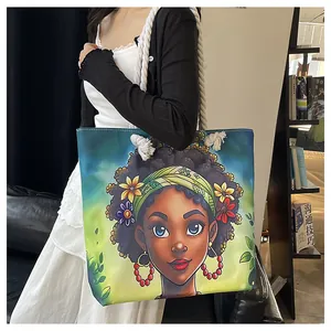 Detail of canvas tote bag with vibrant African woman illustration and white rope handles
