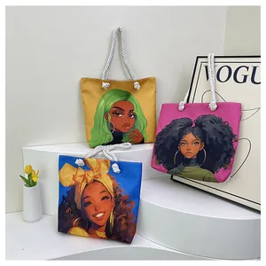 Detailed view of three vibrant canvas tote bags with cartoon prints and rope handles