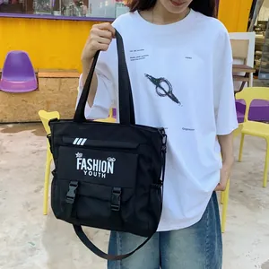 Grand sac bandoulière en toile noire pour étudiant avec imprimé Fashion Youth et boucles