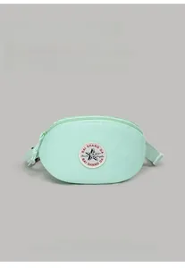 Detail of mint green nylon waist bag featuring star embroidery patch and buckle strap