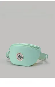 Close-up of mint green nylon waist bag featuring a star logo and adjustable strap