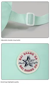 Detail of adjustable strap buckle and star embroidery on mint green canvas crossbody bag