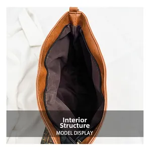 Detailed interior view of the brown large capacity tote bag with smooth metal zipper