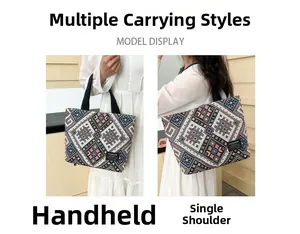 Detailed view of the multi-way carry tote bag showing hand-held and shoulder styles