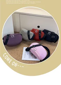 Selection of colorful nylon crescent crossbody bags with adjustable straps in five colors