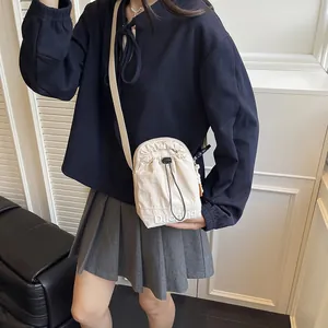 Petit sac bandoulière beige pour téléphone avec cordon et broderie DuoNing chic