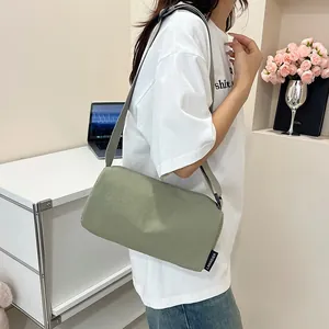 Green sporty nylon crossbody pillow bag with large capacity and lightweight design