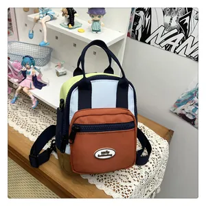 Close-up of a multi-color patchwork mini backpack featuring a smile fashionbag leather label