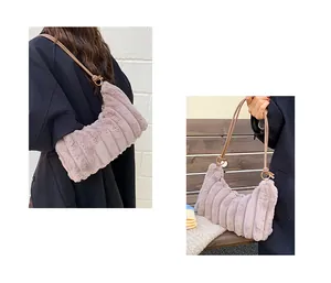 Detail of plush tote bag with vertical corduroy texture and golden ring buckles