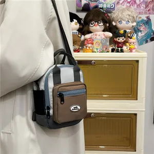 Stylish color-block square crossbody backpack with adjustable straps and metal zipper