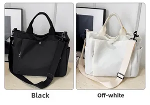 Vue détaillée des sacs fourre-tout multifonctions noir et blanc cassé avec bandoulière