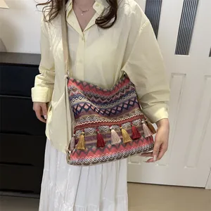 Ethnic bohemian tote with geometric patterns and colorful tassels for women's vacation