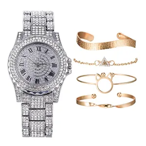 Elegant gold quartz watch set with rhinestones and four matching bracelets for women