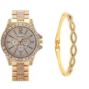 Detail view of gold watch and infinity bracelet set with pavé rhinestones