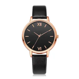 Minimalist black leather quartz watch with rose gold metal case on white background