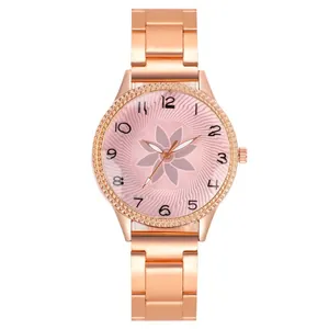 Detailed macro view of rose gold watch face with petal pattern and rhinestone bezel