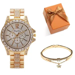 Coffret montre femme à quartz dorée et bracelet diamanté avec pendentif étoile