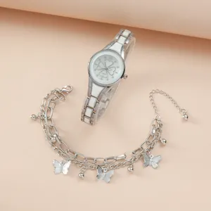 Women's quartz watch and butterfly bracelet set with silver metal bands and clover dial