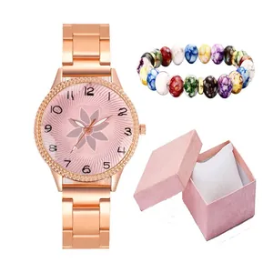 Rose gold watch set with pink floral dial, beaded bracelet, and elegant gift box