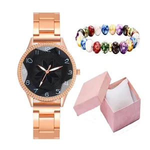 Women's rose gold watch set with black floral dial and colorful beaded bracelet in gift box