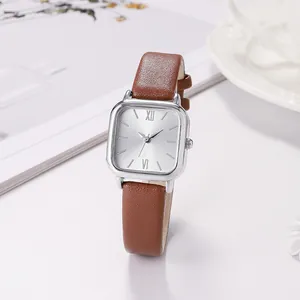 Vintage small square quartz watch for women with brown leather strap and silver dial