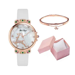 Women's quartz watch with deer motif and crystals, including star charm bracelet and pink gift box