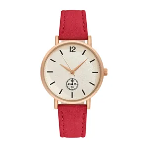 Detail of red matte strap women's watch with rose gold case and small seconds dial