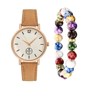 Women's rose gold quartz watch with brown suede strap and marble beaded bracelet set