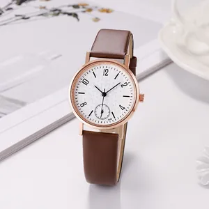 Fashionable women's quartz watch with brown leather strap and floral pattern dial