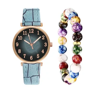 Women's quartz watch with leaf pattern dial and colorful beaded bracelet set