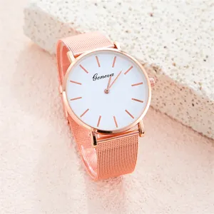 Elegant rose gold mesh strap watch for women with minimalist white dial by Geneva
