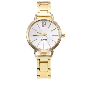 Montre à quartz dorée pour femme avec cadran blanc et bracelet en acier inoxydable