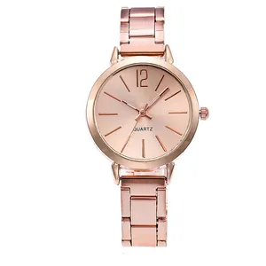 Montre à quartz élégante en or rose pour femme avec cadran minimaliste et bracelet métal