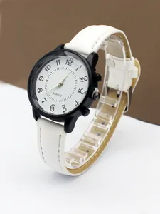 Detailed side view of a white leather strap watch with black case and wave texture dial