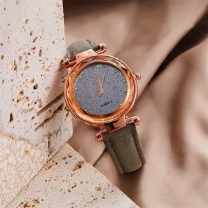 Starry sky dameshorloge met roségouden bezel en grijze matte wijzerplaat met stras