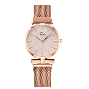 Elegant rose gold women's quartz watch with mesh strap and leaf texture dial