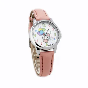 Close-up of pink leather watch strap and silver case with a cute rabbit and balloon dial