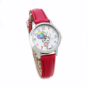Macro view of cartoon rabbit watch with pink strap and colorful numeral dial for kids