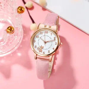 Detail of pink cat-ear alloy watch with rose gold case and cute kitten dial pattern