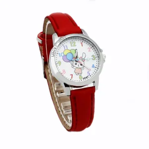 Macro view of kids quartz watch featuring a red leather strap and lucky child engraved bezel