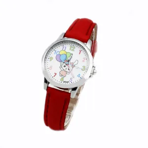 Close-up of red leather strap and lucky child engraved silver bezel on quartz watch