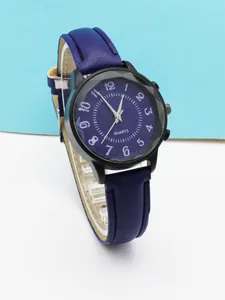 Close-up of women's quartz watch featuring purple wave texture dial and black matte case